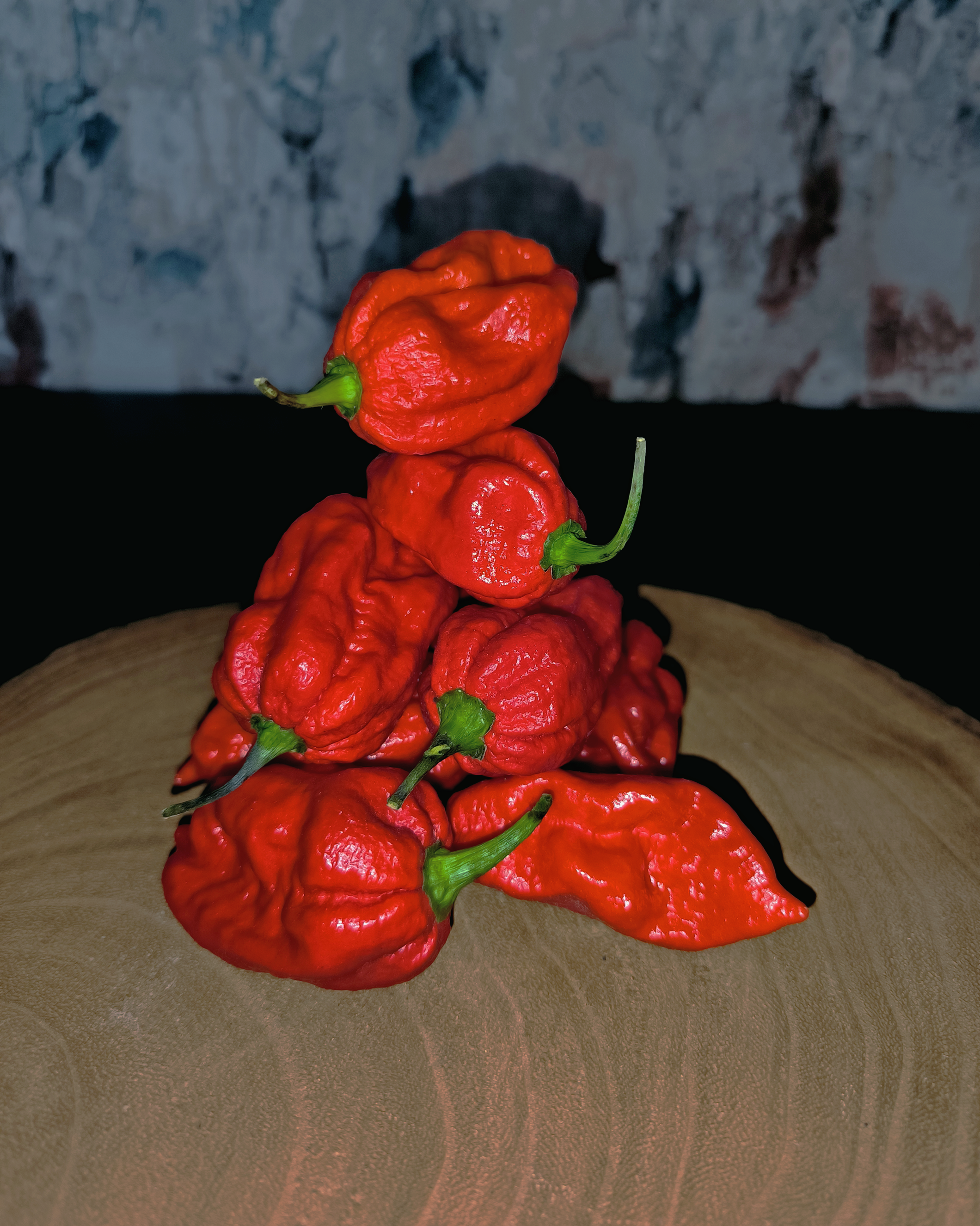 Harvested Naga Viper chili peppers showing wrinkled superhot shape